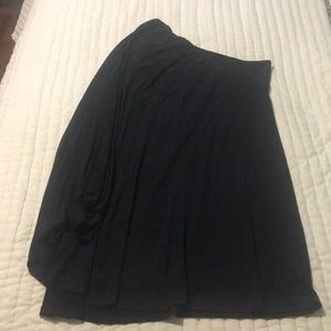 One shoulder/one sleeve sleek black mini dress